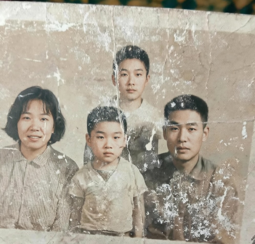 Original old photo before AI restoration β showing damage, scratches, and faded details